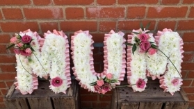 Pink luxury corsage sprays create your own word