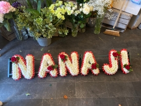 Nana Ji tribute with corsage sprays