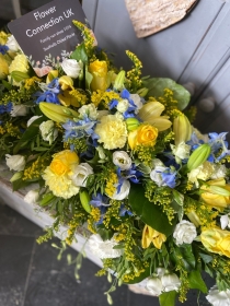 Blue & Yellow Casket Spray