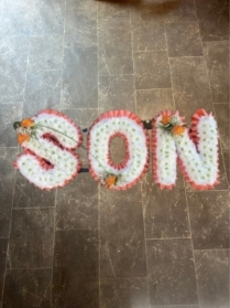Son Tribute with corsage and spray