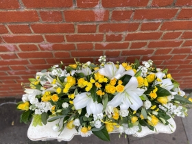 Yellow and White Coffin Tribute