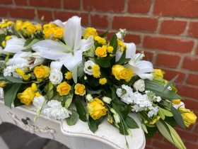 Yellow and White Coffin Tribute